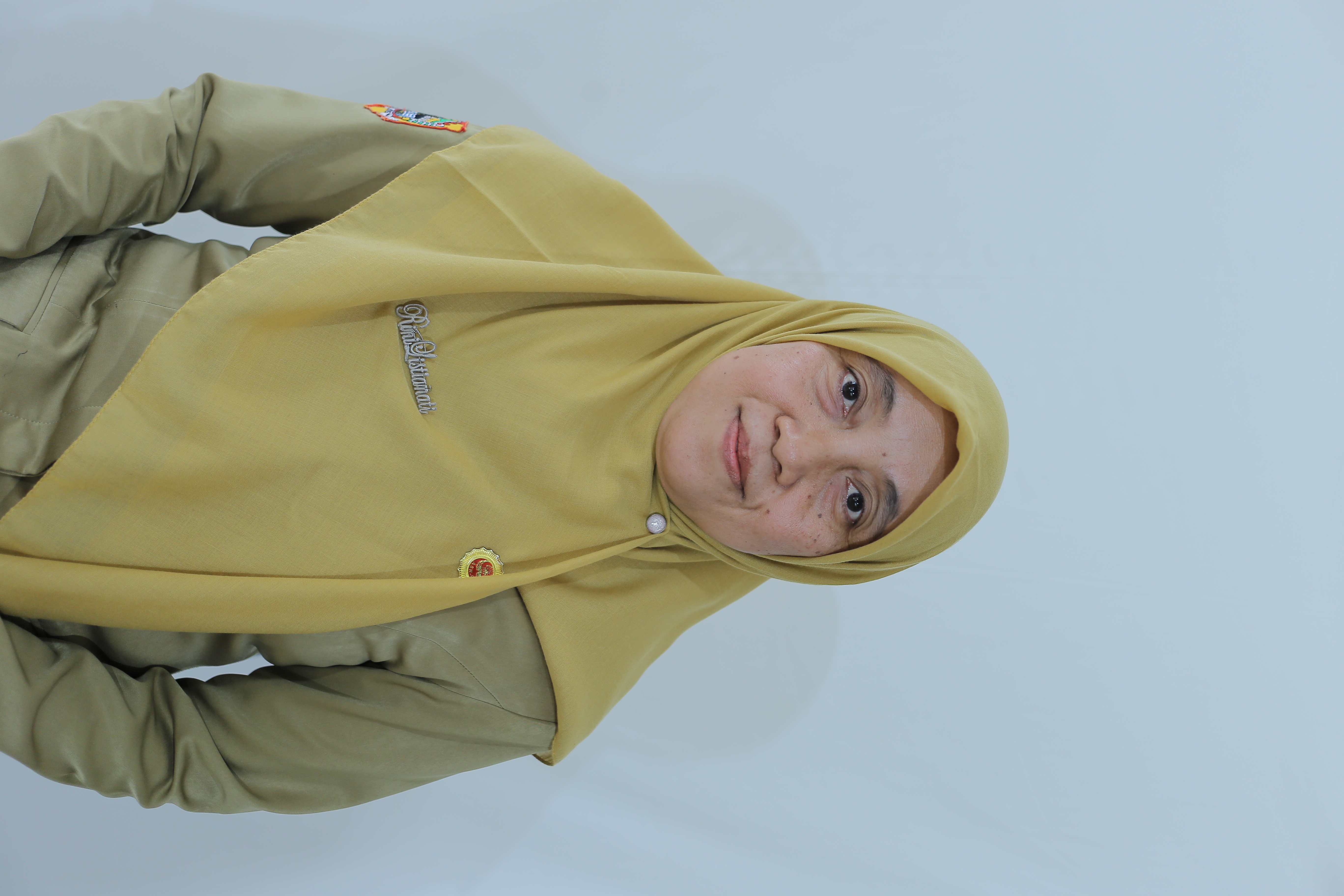 Rini Listianati, S.Pd